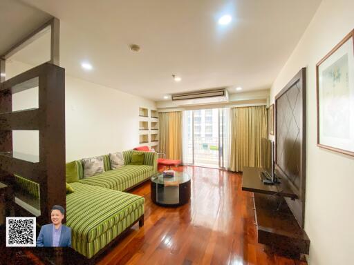 Spacious living room with modern furniture and natural light