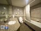 Modern bathroom with grey tiles, a bathtub, and a large mirror