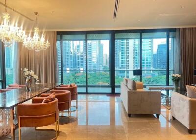 Modern living room with large windows and city view