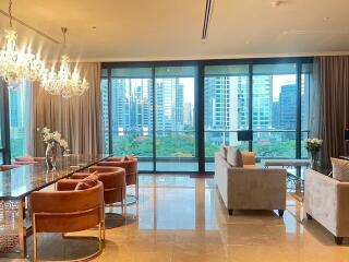 Modern living room with large windows and city view