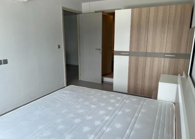 Spacious bedroom with large wardrobe and air conditioning