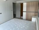 Spacious bedroom with large wardrobe and air conditioning