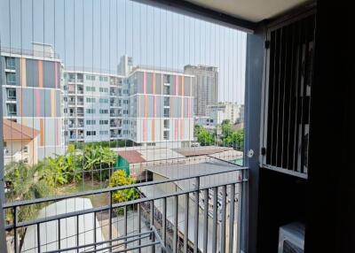 Balcony with view of surrounding buildings