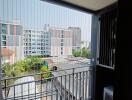 Balcony with view of surrounding buildings