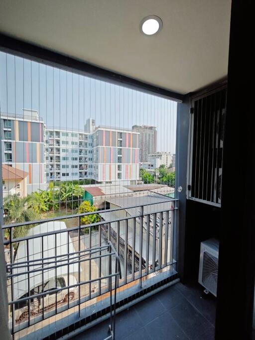 Balcony with view of surrounding buildings