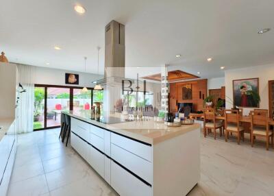 Modern and spacious kitchen with large island and dining area