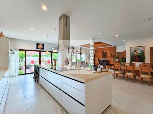 Modern and spacious kitchen with large island and dining area