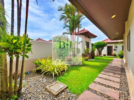 Beautifully landscaped garden with walkway