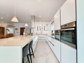 Modern kitchen with island and built-in appliances