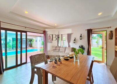 Dining area with a view of the pool