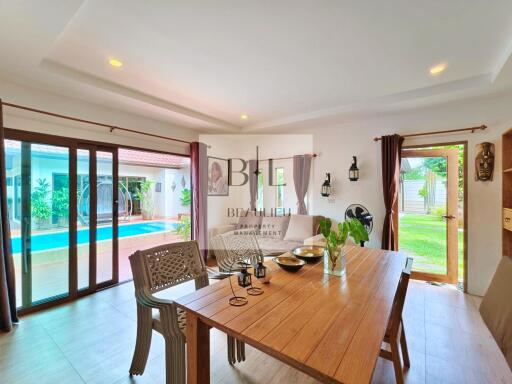 Dining area with a view of the pool