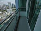 High-rise apartment balcony with city view