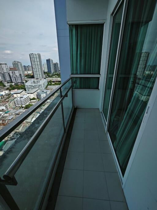 High-rise apartment balcony with city view