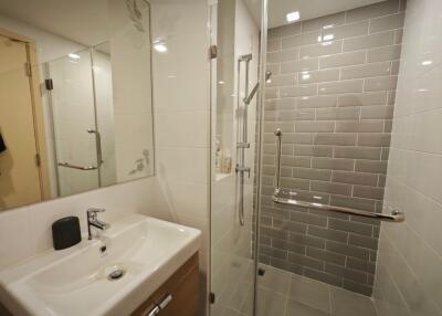 Modern bathroom with shower enclosure and vanity