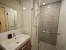 Modern bathroom with shower enclosure and vanity