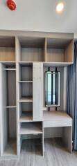 Built-in wardrobe with desk and shelves