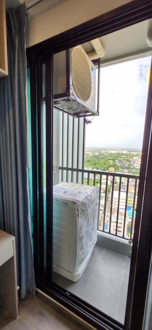 Balcony with a view and a washing machine