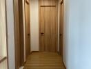 Wooden hallway with four doors