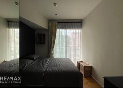 Modern 2-bedroom, fully furnished, close to Asoke BTS.