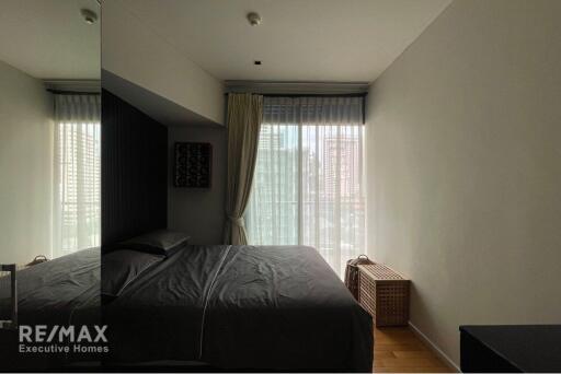 Modern 2-bedroom, fully furnished, close to Asoke BTS.