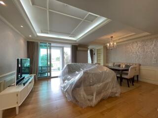 Living room with covered furniture