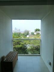 Balcony with a view and wooden bench