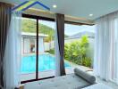 Bedroom with a view of a swimming pool and outdoor area