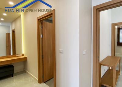 Hallway with wooden doors in a modern house