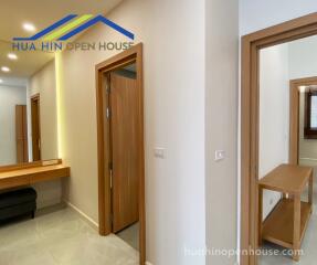 Hallway with wooden doors in a modern house