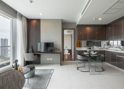 Modern living area with open kitchen and dining space