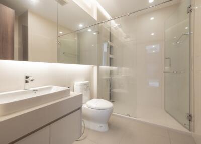 Modern bathroom with glass shower enclosure