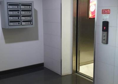 Elevator entrance with mailboxes