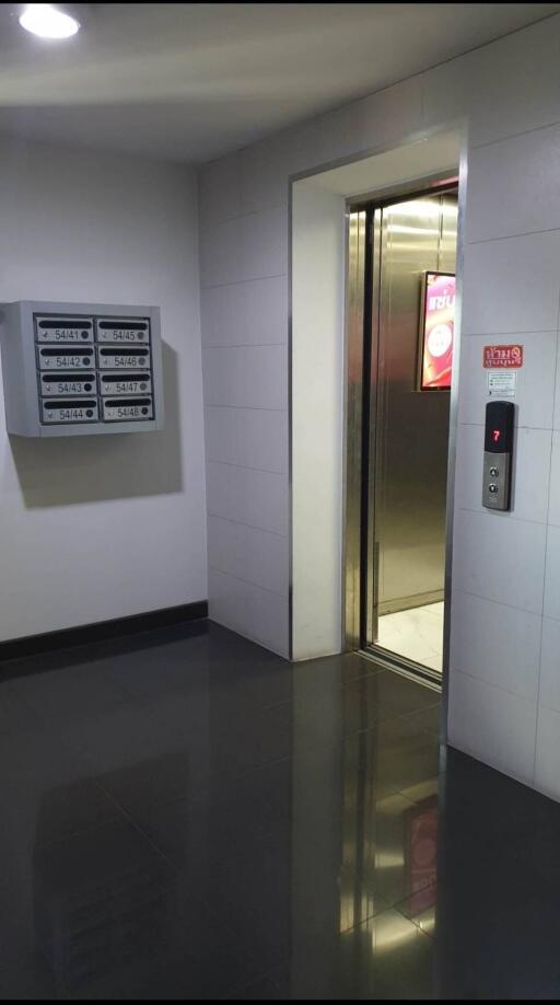 Elevator entrance with mailboxes