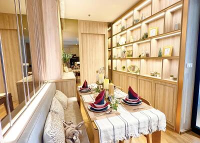 Elegant dining area with wooden furniture and shelf