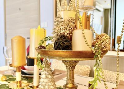 Decorated dining table with candles and ornaments