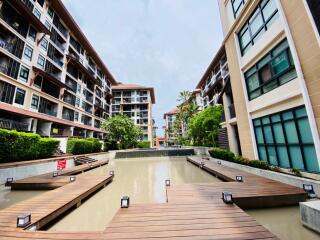 Condominium complex with buildings and private dock area