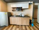 Modern kitchen with wooden cabinets and appliances