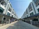 Street view of modern multi-story townhouses