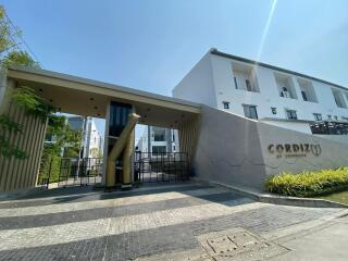 Entrance of a modern gated residential building complex