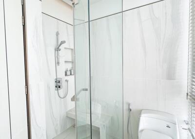 Modern bathroom with glass shower enclosure