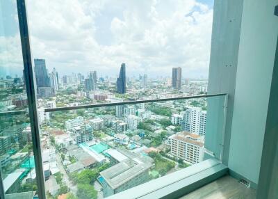 High-rise apartment balcony with a city view