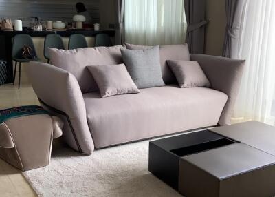 Modern living room with gray sofa and coffee table