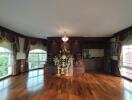 Spacious living room with wooden flooring