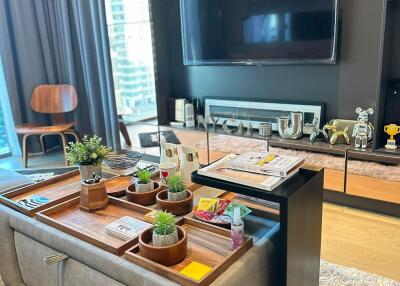 Modern living room with entertainment unit and city view