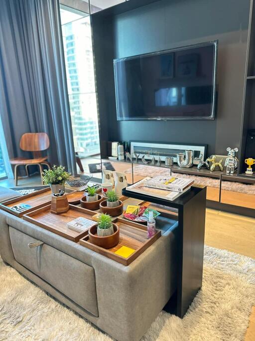 Modern living room with entertainment unit and city view