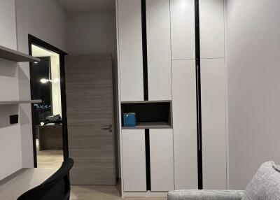 Modern bedroom with wardrobe and desk