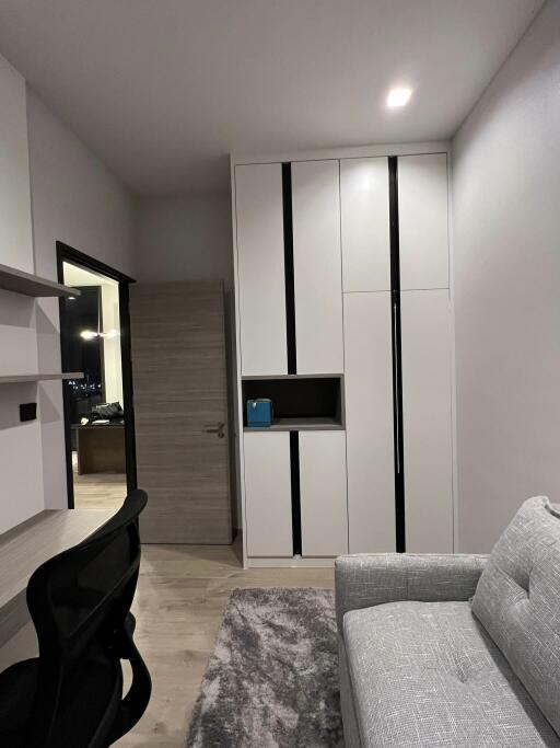 Modern bedroom with wardrobe and desk