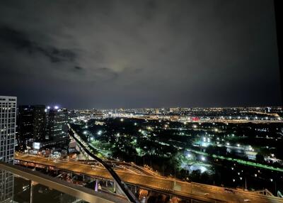 Aerial night view of city buildings and roads