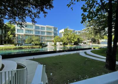 Modern apartment complex with pool view