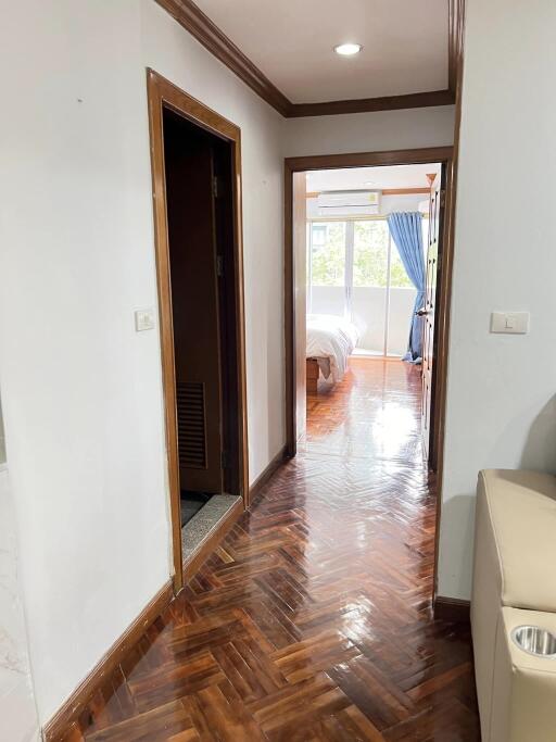 Hallway leading to a bedroom